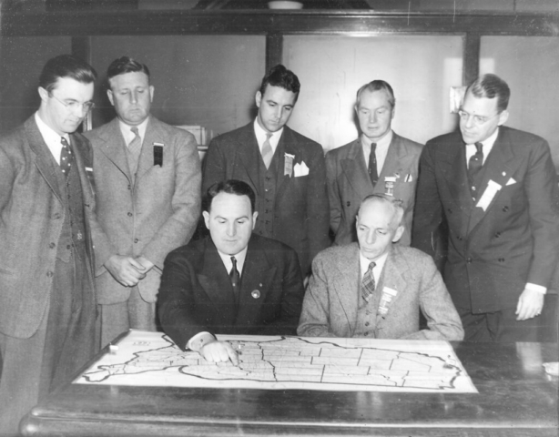 November 29, 1940 meeting in LaCrosse, WI, of the National Security Agency’s National Volunteer Winter Defence Committee. Front row, from left to right: Roger Langley, Lieutenant Colonel Nelson M. Walker. Back row, from left to right: Lloyd C. Ellingson, NSA Secretary; Lt. Cl. Charles E. Hurdis; Robert D. Johns, head of the local committee organizing the meeting; John E.P. Morgan, National Ski Patrol System; Minnie Dole, National Ski Patrol System. Charles E. Hurdis. Assigned by General Marshall to study the country’s readiness for mountain warfare in the aftermath of the 1939 Soviet invasion of Finland, Lieutenant Colonels Hurdis and Walker’s support for a mountain division was key to its formation. In an essay in the 1946 American Alpine Journal War Edition entitled “The 10th Mountain Division: A Successful Experiment,” Albert Jackman noted, “To these officers great credit is due for their part in organizing the first mountain regiment and in encouraging the War Department to continue to give direct aid to mountain training.” Courtesy New England Ski Museum
