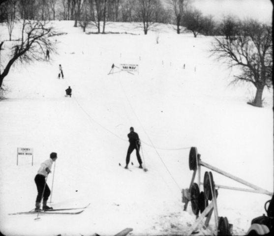 Early rope tow in the mid-1930s, likely in New Hampshire. Until skiing got mechanized, skiers didn’t do much of it, as it took too much effort. Photo credit: New England Ski Museum