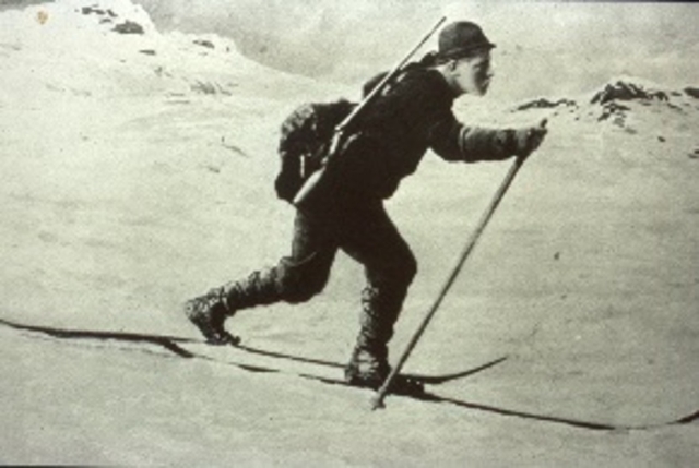 Famed Norwegian explorer Fridtjof Nansen practicing for his 1888 crossing of Greenland. Nansen and five teammates spent six weeks skiing across the ice cap from east to west to become the first to cross Greenland’s inland. Nansen was the first to promote the Norwegian concept of Idraet: skiing as an outdoor activity that improves physical as well as moral strength. The closest translation might be Mens sana in corpore sano: a sound mind in a sound body. The concept lay at the heart of the ski tradition the Norwegians brought to America in the mid- to late-1800s. It helped define the nascent sport in this country until it was displaced by the professionalism of ski jumping and the pursuits of downhill and slalom skiing.  Photo credit: New England Ski Museum