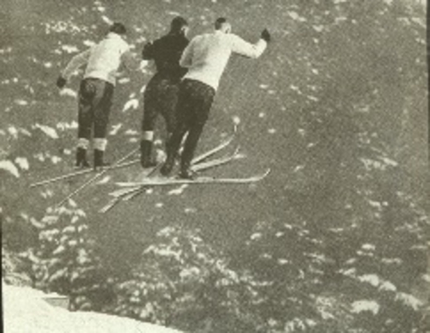 DOC members jumping in tandem, possibly in Hanover. Tricks like this got skiers into newspapers. Photo credit: New England Ski Museum