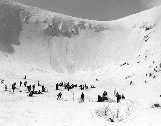 Mt. Washington’s Tuckermans Ravine. Mt. Washington was first ascended on skis in 1910. By the 1930s, Tuckermans became a pilgrimage for anyone who thought of themselves as skiers. Access was made easier in 1927, when the major roads going over passes were kept open in winter for the first time. Photo credit: New England Ski Museum