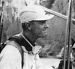 John Woodward (1915-2016) Major John Woodward (HQ 1ST 87TH INF) played a central role in the 10th Mountain Division’s skiing, serving as an instructor and helping to modify the style of skiing used by the soldiers. Born in Iowa, he grew up in Seattle, and became one of the Northwest’s top skiers. Though renowned for his downhill and slalom skiing talents, Woodward had learned the Scandinavian specialities of cross-country, ski jumping and telemark skiing from Norwegians at the Seattle Ski Club Lodge. He’d also qualified for the 1936 Olympics only to have his Olympic dreams thwarted by the University of Washington, which was not interested in sponsoring a student’s long trip to Europe during the academic year.   Instead, Woodward finished his studies, graduating with degrees in economics and business and dipping his ski boot in the still-nascent ski industry by running a couple of University-affiliated ski shops. He’d also earned a second lieutenant commission from the university’s Reserve Officer Training Corps while ski racing up and down the west coast. During the winter of 1940-1941, he led the 3rd Division’s experimental ski patrol of the 15th Infantry, and then assisted the 41st Division’s ski patrol with its training—the only man who contributed to both.    At Camp Hale, Colorado, Woodward was given command of the mountain training program and helped produce the Army’s first ski training films. He deployed to Italy with the rest of the Division in early 1945, where he saw action as a major in the 1st Battalion of the 87th Mountain Infantry. Post-war, he became a central figure in the American ski industry, becoming a partner at Anderson & Thompson, importing and distributing brands such as Salomon, Dynastar and Kastinger. He continued racing, and winning, well after his retirement, as he skied into his nineties.