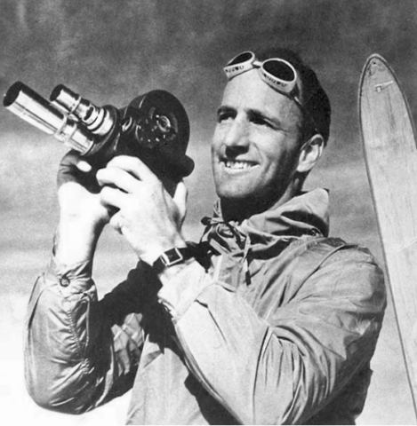 John Clarkson Jay IV (December 11, 1915–2000) (10TH RECON) played a decisive role in the 10th Mountain Division. The great-great-great grandson of the first Chief Justice of the United States, Jay first learned to ski in 1932 while attending New Hampshire’s St. Paul's School. He began filming with the family 16mm camera two years later, and in 1935, he entered Williams College, where he spent winter weekends at the first U.S. rope tow at Woodstock, Vermont.    During his undergraduate winters, Jay filmed numerous local events, including the Williams Winter Carnival, the Dartmouth Winter Carnival, the second Inferno Race down the Headwall of Tuckerman's Ravine, and the Madison Square Garden's Winter Sports Show. Time, Inc. hired Jay to write commentary for the prestigious March of Time.   He released his first short film, Sons of Eph, in 1937, and graduated from Williams the following year. In the late 1930s, he was commissioned by Williams College, the Canadian Pacific Railway, and Panagra airline to produce promotional films. He was selected for a Rhodes Scholarship in 1939 but the war intervened.   In 1940, he released his first feature film, Ski the Americas, North and South, which played to more than 50,000 viewers during its tour. The following year, he released two more films, South for Snow and Ski Here, Señor. He was also drafted into the Army. Assigned to the Signal Corps, he traveled to Sun Valley to make the training film, The Basic Principles of Skiing, which would be used to train mountain troops throughout the war.   In January 1942 he was assigned to the Mountain and Winter Warfare Board at Ft. Lewis as Photographer and Meteorologist. His responsibilities would expand to include public relations, and in the spring of 1942 he returned to Sun Valley to make ten additional training films for the mountain troops. He also released They Climb to Conquer, and the following year released Ski Patrol, which the Army used to help with its recruitment efforts.    Throughout the war, Jay continued to make training and recruiting films and evaluated equipment for winter warfare. In late 1943 he was promoted to Major and named Commanding Officer of the 10th Mountain Division’s  Reconnaissance Troops. In 1944, he wrote the definitive History of the Mountain Training Center, which was released in 1948.   Following the war, he embarked on his defining accomplishment as the father of modern ski cinematography, releasing nearly a film every year for the next thirty years.