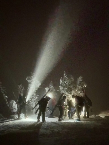Participants gather on the summit of Mt. Glory at 10,050 feet. Photo: Isaac Shaal